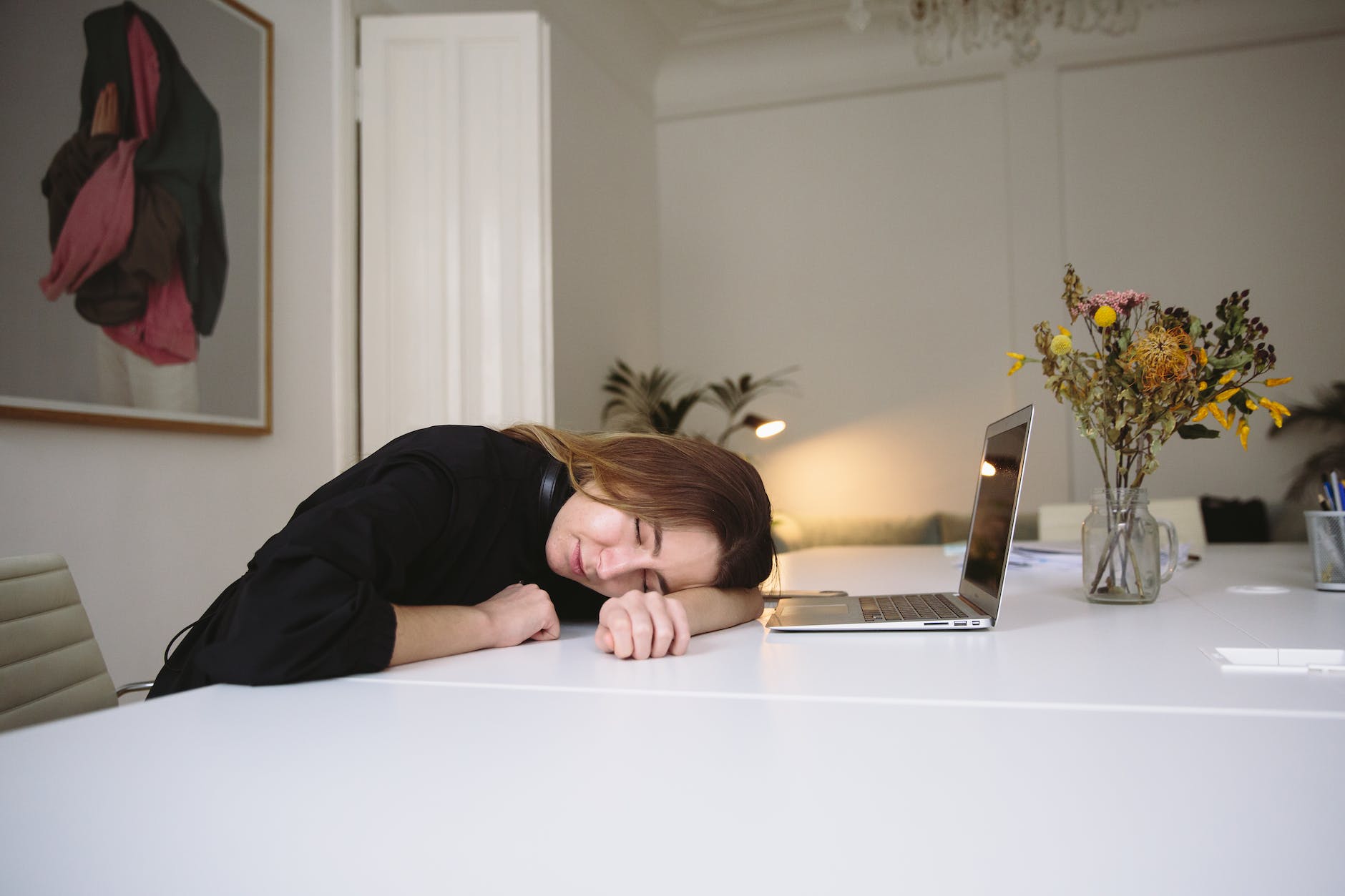 woman sleeping on table