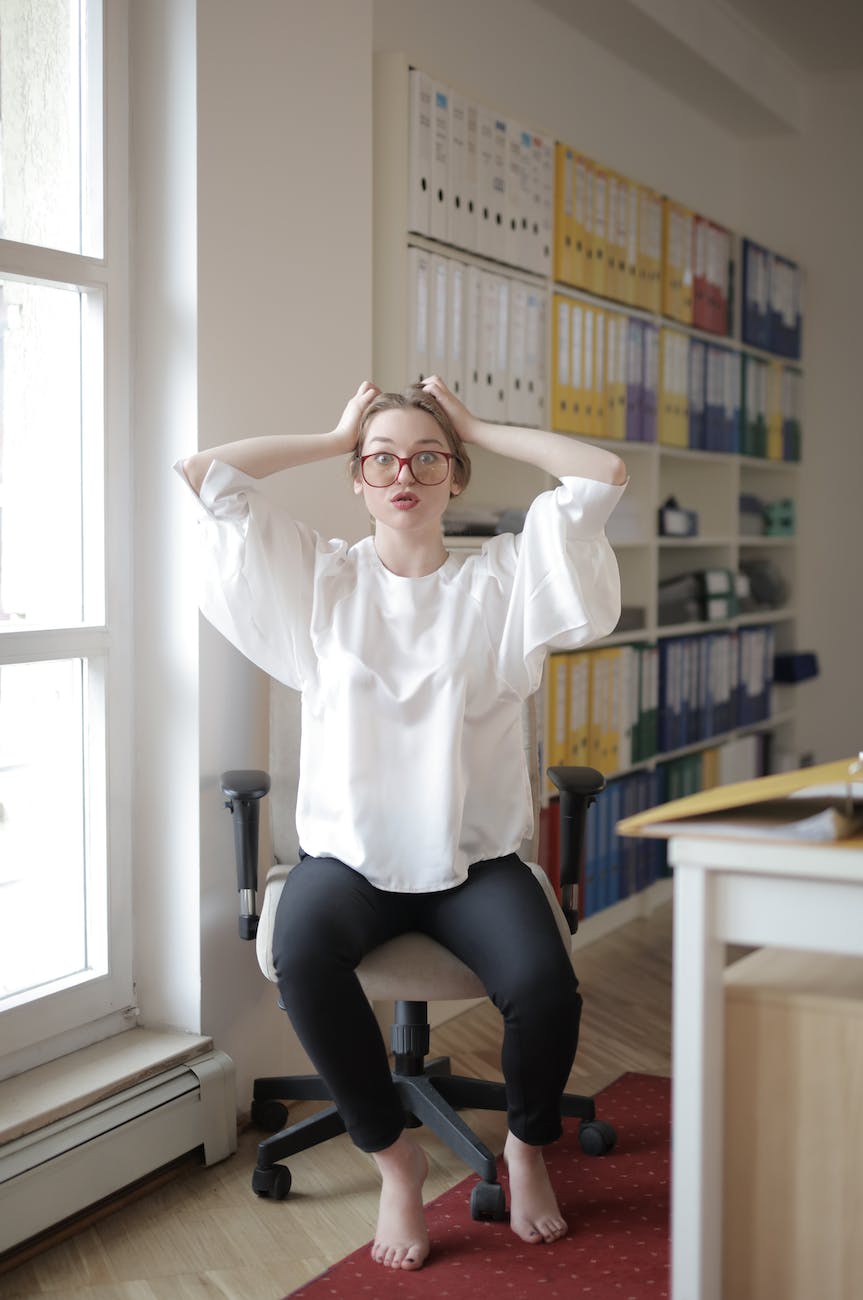 shocked female worker in modern workplace